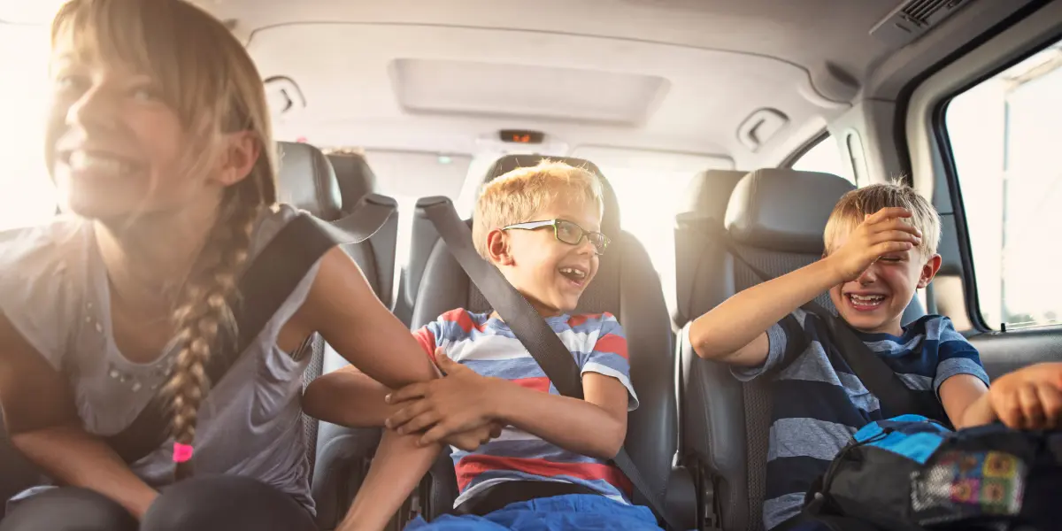 Spring Break Trips for Families - Children laughing in car