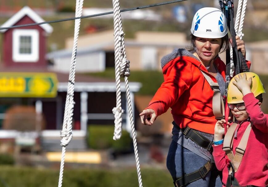 Mother and son traverse the Foothills Park at High Gravity Adventures.
